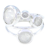 Pilar white gemstone statement ring with four bezel set round stones on polished sterling silver band