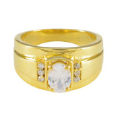 Nisa gold ring with a large central white stone and smaller side stones white halo engagement ring