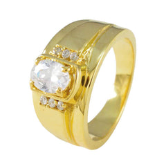Nisa white halo engagement ring with a large central stone and gold band accented by smaller diamonds