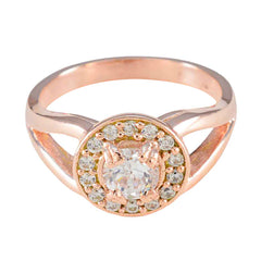 Ivana rose gold white halo ring for women with a central round diamond and surrounding smaller stones