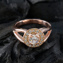 Ivana white halo ring for women with round center stone and surrounding small diamonds in rose gold setting