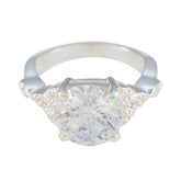 Nova white halo ring for women featuring a large central round gemstone with smaller accent stones