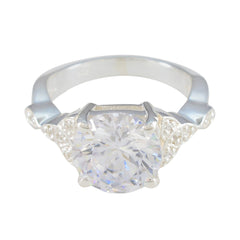 Nova white halo ring for women featuring a large central round gemstone with smaller accent stones
