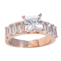 Mei white hepta wedding ring rose gold band with central princess cut stone and baguette side stones