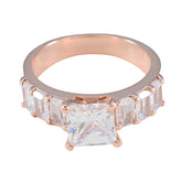 Mei white hepta wedding ring rose gold band with princess cut center stone and rectangular side stones
