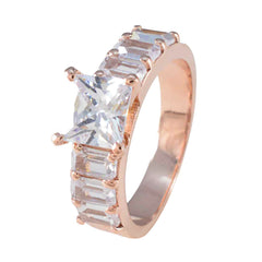 Mei rose gold band white hepta wedding ring with princess cut center stone and baguette side stones