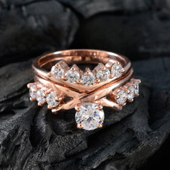 Elena rose gold white multiple stone engagement ring set with round brilliant diamonds and matching chevron band