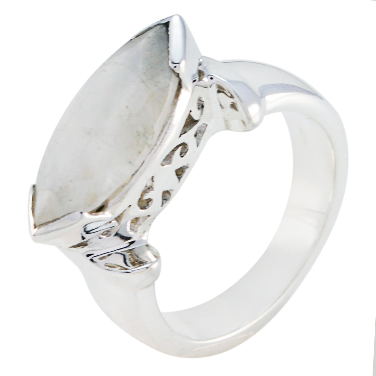 Bruna white solitaire filigree ring with a marquise-shaped stone and intricate silver detailing