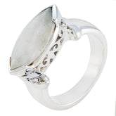 Bruna white solitaire filigree ring with a marquise-shaped stone and intricate silver detailing
