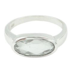 Sophia white solitaire ring for women with an oval clear gemstone set in a polished silver band