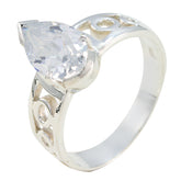 Skylar white solitaire ring with pear-shaped clear stone and decorative silver band
