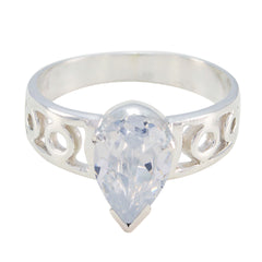 Skylar white solitaire ring with pear-shaped clear gemstone and decorative silver band
