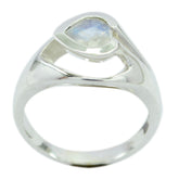 Leah white solitaire ring with a pear-shaped gemstone and polished silver band