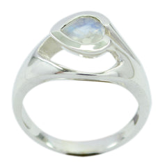 Leah white solitaire ring with a pear-shaped gemstone and polished silver band