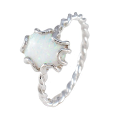 Evelyn white solitaire ring with opal center in scalloped crown prong setting and twisted silver band