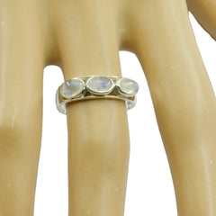 Lili white trilogy ring for women featuring three oval white stones on silver band