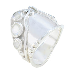 Lily white trilogy ring wide sterling silver band with three round moonstone accents for everyday wear