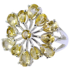 Rebeca yellow floral gemstone ring featuring pear-shaped yellow stones arranged in a flower design