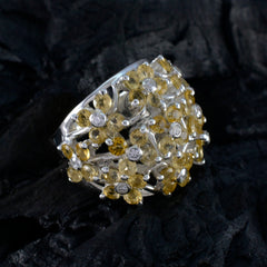 Elena yellow floral gemstone ring with clustered citrine petals and small sparkling white accents in silver