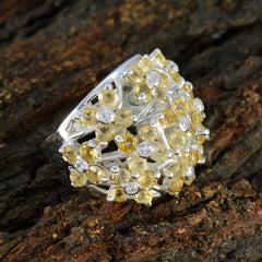 Elena yellow floral gemstone ring in sterling silver with clustered yellow gems and diamond accents