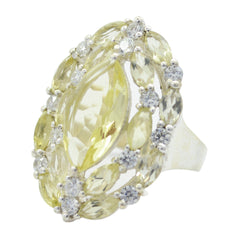 Lourdes yellow gemstone abstract ring with large marquise center stone and halo of smaller yellow gems on silver band