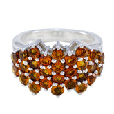 Valentina yellow gemstone cocktail ring with clustered round orange gemstones set in sterling silver band