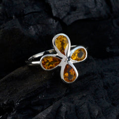 Ying yellow gemstone floral ring with four teardrop yellow gemstones set in silver band