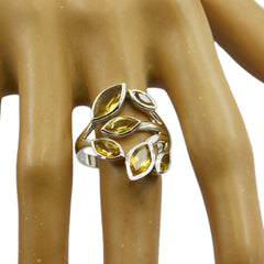 Milagros yellow gemstone leafy ring with multiple marquise-cut stones on silver band