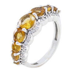 Putri yellow gemstone ring with five oval citrine stones and pave diamond accents on sterling silver band