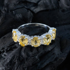 Stella yellow gemstone ring with five oval citrine stones and sterling silver band with accent diamonds