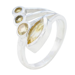 Aurora yellow gemstone ring for women with silver band and multiple yellow stones in unique design