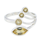 Aurora yellow gemstone ring for women with silver band and multiple yellow stones