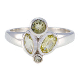 Angel yellow gemstone ring with three differently shaped yellow gemstones set in silver band