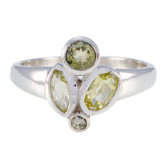 Angel yellow gemstone ring with three differently shaped yellow gemstones set in silver band