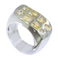 Nova yellow gemstone statement ring with multiple faceted yellow stones set in polished silver band