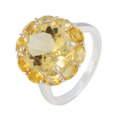 Lili yellow gemstone statement ring with large central gem surrounded by smaller oval stones on silver band