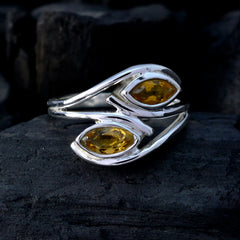 Ines yellow gemstone toi et moi ring with two marquise-cut yellow stones set in polished silver band