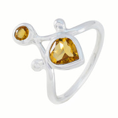 Rosa yellow gemstone toi et moi ring with two faceted yellow stones set in polished silver band