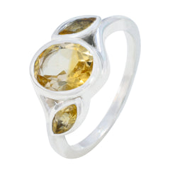 Riley yellow gemstone trilogy ring sterling silver band with oval center stone and two marquise accents