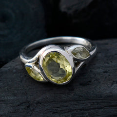Fernanda yellow gemstone trilogy ring with three faceted yellow stones set in silver band