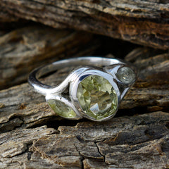 Fernanda yellow gemstone trilogy ring with three yellow gemstones set on a silver band