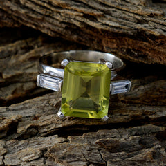 Mila yellow gemstone trilogy ring with rectangular green stone and baguette side stones on silver band
