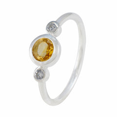 Dewi yellow gemstone trilogy ring with silver band and two small clear stones