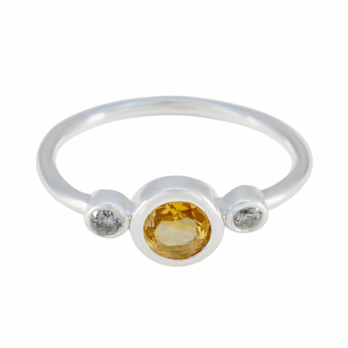 Dewi yellow gemstone trilogy ring with a central yellow gemstone and two smaller clear stones on a silver band