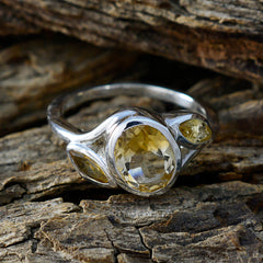 Riley yellow gemstone trilogy ring sterling silver with oval faceted center and two pear side stones