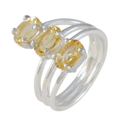 Julia yellow gemstone trilogy ring with three oval yellow stones set in a silver band