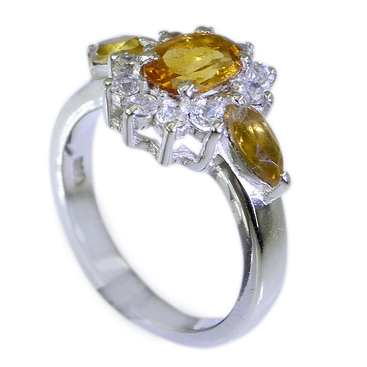 Dewi yellow gemstone trilogy ring with oval yellow stones and surrounding clear crystals on silver band