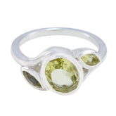 Fernanda yellow gemstone trilogy ring with three faceted yellow gemstones set in silver band