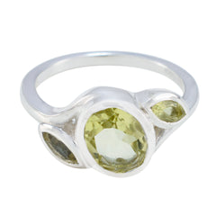 Fernanda yellow gemstone trilogy ring with three faceted yellow gemstones set in silver band