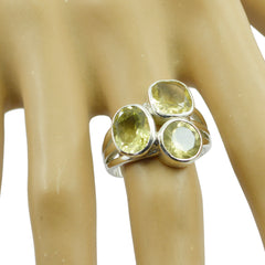 Nova yellow gemstone trilogy ring with three bezel set yellow stones on sterling silver band